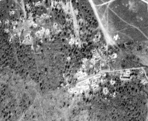 Here is this place, on the German Luftwaffe Aerial Reconnaissance Photograph, avg. scale - 1:35000-1:38000. The white squares is dugouts. Their full location isn't was shown on the headquarters map